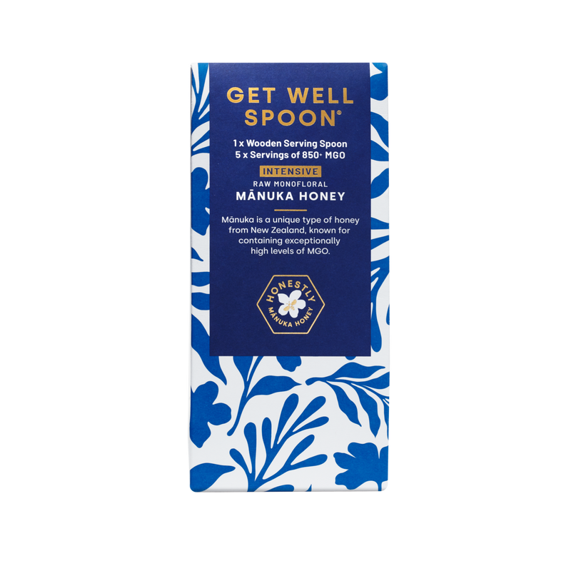 Packaging of a 'Get Well Spoon' with blue floral design and text on a white background